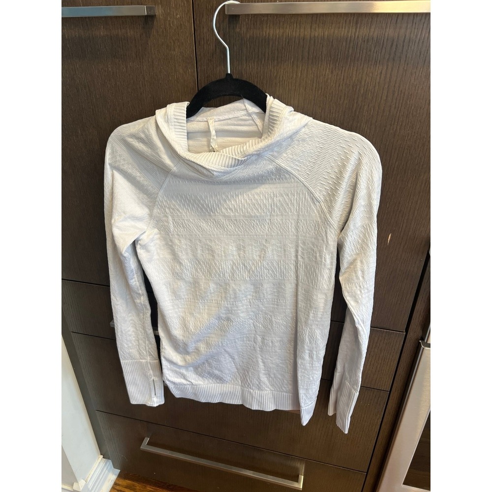 Lululemon Rest Less Seamless Hoodie in a white or heathered white 8